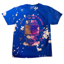 Load image into Gallery viewer, A royal blue t shirt with an abstract bleached effect. The t-shirt reads &quot;Water is life, life is water. The sound of the ocean, the dance of the waves. Guided meditation from the edge of the world.&quot;
